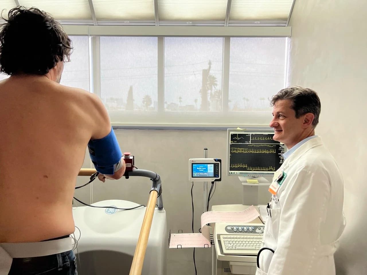 Dr. Kedan performing a comprehensive cardiac physical examination