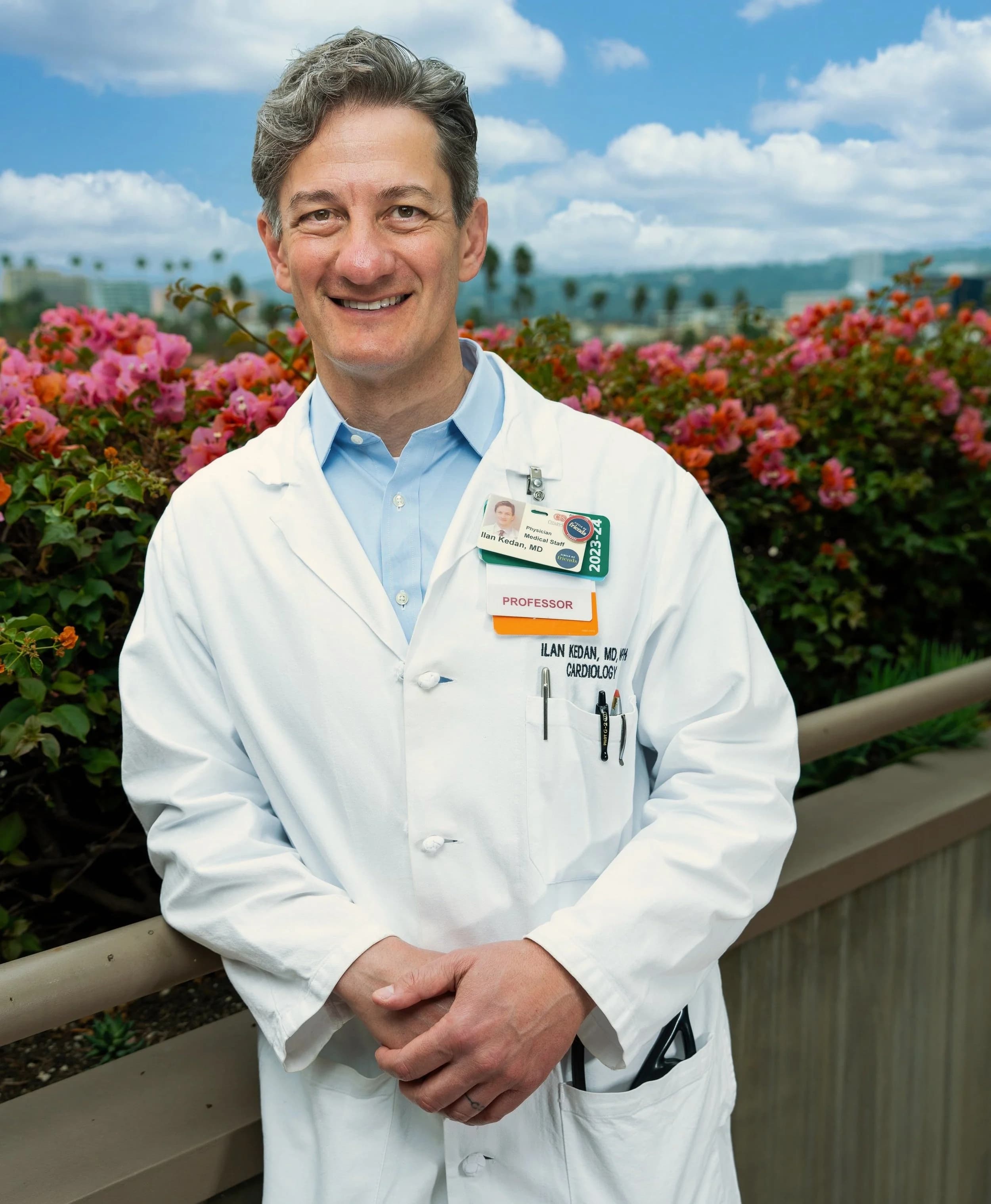 A folder of prior cardiac imaging and lab records ready for review